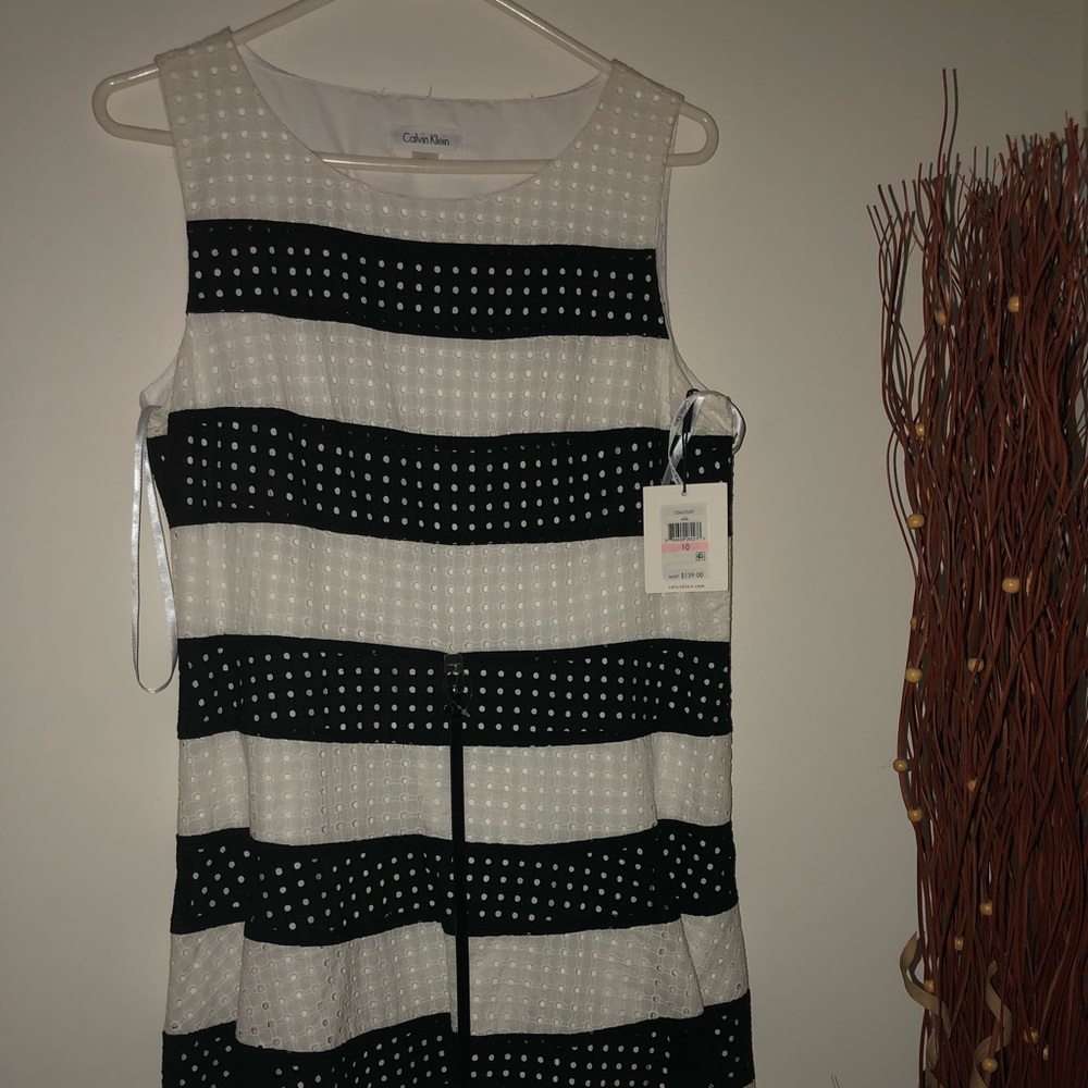 Calvin Klein’s black and white sleeveless dress
